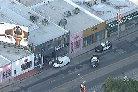 Armed-robbery suspect wounded in shooting involving LAPD on Melrose, flees scene